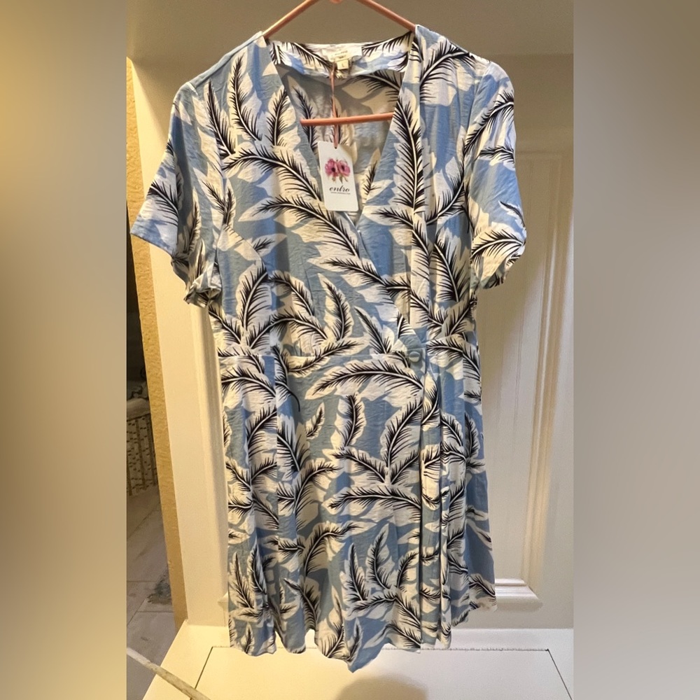 NWT Above the knee dress with blue floral design. Linen fabric.